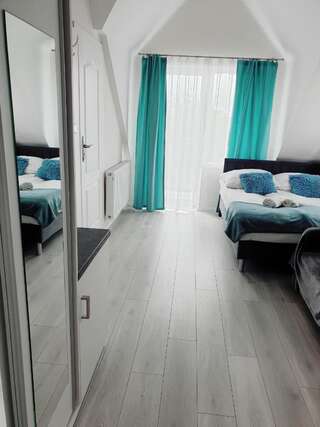Отели типа «постель и завтрак» Solar Bed & Breakfast Карвия Трехместный номер с балконом-1
